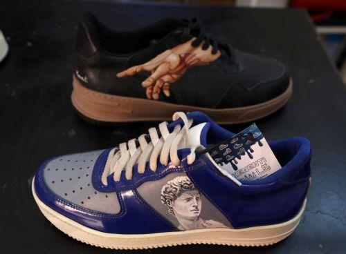 epa11847351 Artistically restored old shoes are displayed at the workshop 'Kenenti' in Tunis, Tunisia, 23 January 2025. The Tunisian startup 'Kenenti', created by Sherif Zerevi, brings new life into worn items, by transforming old shoes and leather bags through artistic restoration, preventing footwear and accessories from ending up in landfills and not...