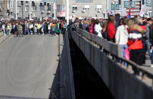 epa11856324 Protesters take part in the blockade of the 'Autokomanda' intersection in Belgrade, Serbia, 27 January 2025. University students staged a protest, demanding accountability after fifteen people lost their lives in the collapse of the Novi Sad Railway Station canopy on 01 November 2024. The station building, which had been renovated and reopened...
