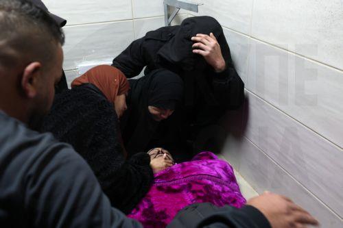 epa11869815 People mourn next to the body of their Palestinian relative killed during an Israeli military operation, at Ibn Sina Hospital in the West Bank city of Jenin, 02 February 2025. Over two dozen Palestinians have been killed, according to the Palestinian Ministry of Health, and one Israeli soldier killed, according to the Israeli army, since the...