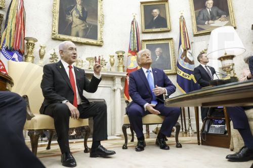 epa11875577 Israeli Prime Minister Benjamin Netanyahu (L) and US President Donald J. Trump (R) talk with reporters in the Oval Office of the White House in Washington, DC, USA, 04 February 2025. President Trump, who is hosting his first in-person meeting with another world leader since returning to the White House, and Prime Minister Netanyahu are set to...