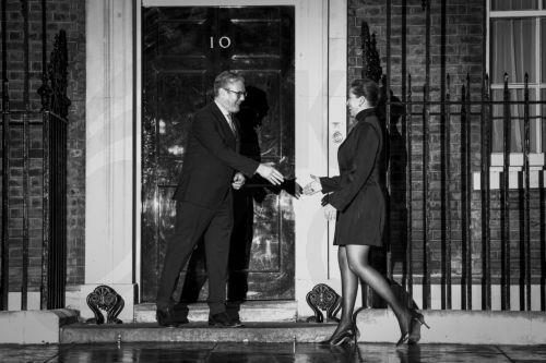 epa11875608 Denmark Prime Minister Mette Frederiksen (R) shakes hands with United Kingdom Prime Minister Keir Starmer, in London, United Kingdom, 04 February 2025. Starmer is hosting Frederiksen  for a working dinner where they will discuss security and migration in Europe.  EPA/MADS CLAUS RASMUSSEN  DENMARK OUT