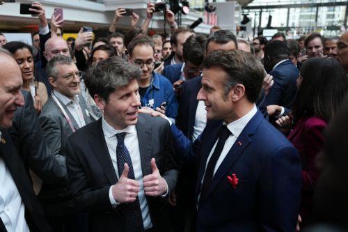 epa11888526 CEO of OpenAI Sam Altman (C-L) speaks with French President Emmanuel Macron (C-R) during an event at Station F, a startup campus, on the sidelines of the Artificial Intelligence (AI) Action Summit, in Paris, France, 11 February 2025. The summit takes place from 10 to 11 February.  EPA/AURELIEN MORISSARD / POOL MAXPPP OUT