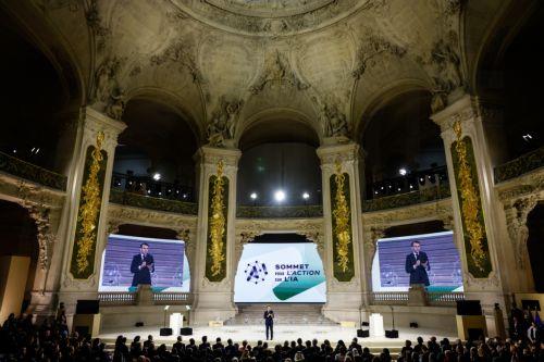 epa11888550 French President Emmanuel Macron (C) delivers a speech during a plenary session of the Artificial Intelligence (AI) Action Summit at the Grand Palais in Paris, France, 11 February 2025. The summit takes place from 10 to 11 February.  EPA/MOHAMMED BADRA