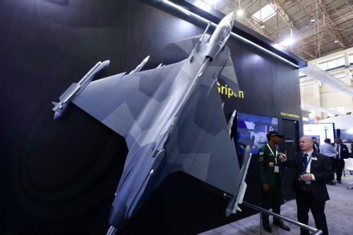 epa11888635 A replica of the Swedish aerospace and defence company Saab's Gripen cockpit simulator on display during the 15th 'Aero India' air show at the Yelahanka Air Force Station in Bangalore, India, 11 February 2025. The air show and aviation exhibition gathers more than 800 global exhibitors and runs from 10 to 14 February 2025.  EPA/JAGADEESH NV