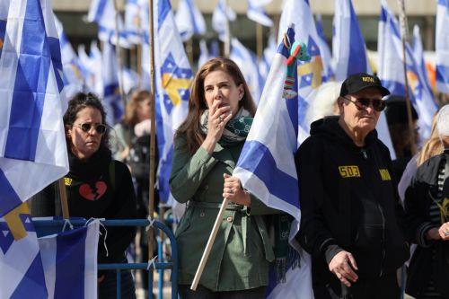 epa11909167 People gather at Hostages Square ahead of the release of the bodies of four Israeli hostages held in Gaza, in Tel Aviv, Israel, 20 February 2025. Hamas was set to hand over the bodies of four Israeli captives, including that of youngest hostage Kfir Bibas, as part of the ongoing Gaza ceasefire deal. Hamas said in November 2023 that the two Bibas...