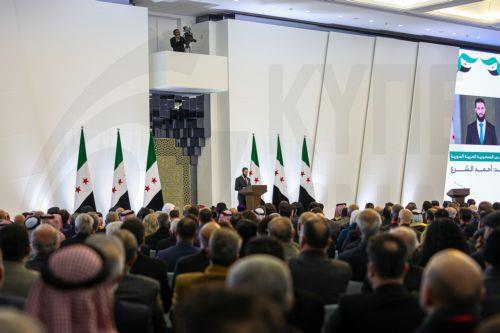 epa11923677 Syrian interim President Ahmed al-Sharaa (C) delivers a speech during the Syrian National Dialogue Conference in Damascus, Syria, 25 February 2025. The conference, which aims to approve recommendations related to the foundations of the country's upcoming transitional phase, kicked off with the participation of hundreds of figures representing...