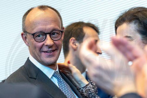 epa11923841 Chairman of the Christian Democratic Union (CDU) party and faction Friedrich Merz (L) attends a CDU/CSU parliamentary group meeting at the German parliament, Bundestag, in Berlin, Germany, 25 February 2025. Germany held early federal elections on 23 February 2025.  EPA/ANDREAS GORA / POOL