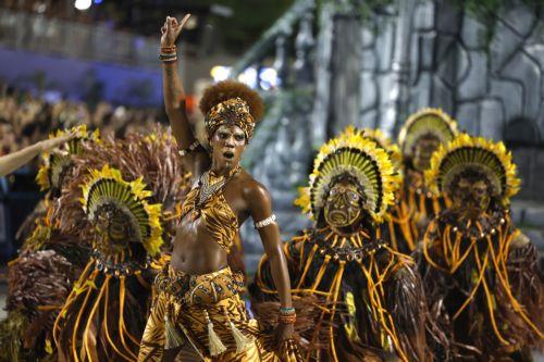 epa11941493 Members of Paraiso do Tuiuti samba school participate in the third day of parades at the Marques de Sapucai Sambodromo in Rio de Janeiro, Brazil, 04 March 2025.  EPA/Antonio Lacerda