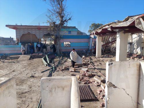 epa11941621 Local residents inspect the scene of a suicide bomb attack in Bannu, Khyber Pakhtunkhwa (KPK) province, Pakistan, 05 March 2025. Suspected insurgents attacked an army base in Bannu district, northwestern Pakistan, killing at least 12 civilians and wounding many others on the evening of 04 March, police said. According to authorities, two suicide...