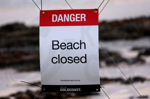 epa11941627 A beach closed sign is displayed at Snapper Rocks on the Gold Coast, Queensland, Australia, 05 March 2025. Tropical cyclone Alfred is set to bring heavy rainfall and damaging winds, and is expected to impact a part of the Australian coast for the first time in more than 50 years. Residents are advised to prepare for incoming tropical cyclone...