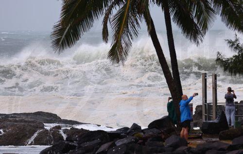 epa11941633 People are seen at Snapper Rocks on the Gold Coast, Queensland, Australia, 05 March 2025. Tropical cyclone Alfred is set to bring heavy rainfall and damaging winds, and is expected to impact a part of the Australian coast for the first time in more than 50 years. Residents are advised to prepare for incoming tropical cyclone Alfred which is due...