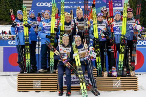 epa11947182 (L-R) Silver medalist Team Norway, gold medalist Team Sweden, and bronze medalist Team Germany pose on the podium after the Women's Cross-Country Relay 4x7.5 km C/F at the FIS Nordic World Ski Championships in Trondheim, Norway, 07 March 2025.  EPA/Gorm Kallestad  NORWAY OUT