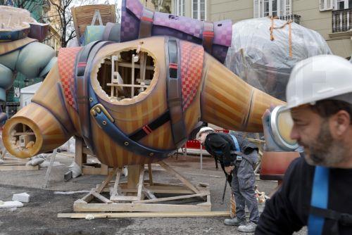 epa11953461 Artists Work on a Falla in Valencia, Spain, 10 March 2025. The Fallas festival is a fortnight-long fiesta featuring installations of parodic papier-mache, cardboard, and wooden sculptures that parody both fictitious and real people and situations. These sculptures decorate the streets and are traditionally burned on the last day of the event (19...