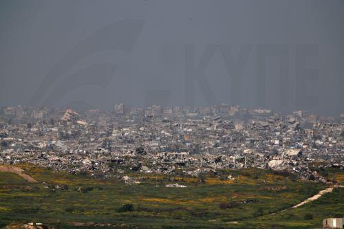 epa11970925 The rubble of destroyed buildings in the northern Gaza Strip, as seen from the Israeli side of the border near Sderot, Israel, 18 March 2025. The Israeli forces on 18 March confirmed they were carrying out 'extensive strikes' on targets in the Gaza Strip, following an Israeli prime minister's statement which ended the ceasefire in place since 19...