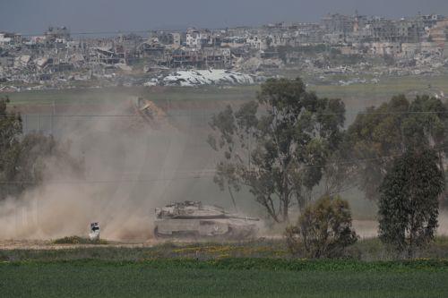 epa11971169 An Israeli tank patrols along the border with the Gaza Strip, as seen from an undisclosed location in Israel, 18 March 2025. The Israeli forces on 18 March confirmed they were carrying out 'extensive strikes' on targets in the Gaza Strip, following an Israeli prime minister's statement which ended the ceasefire in place since 19 January....
