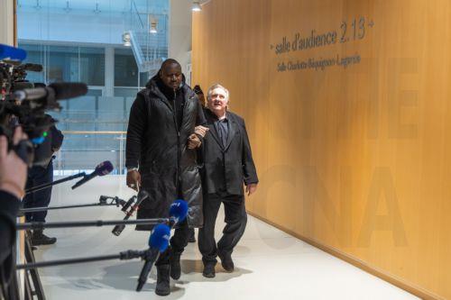 epa11989379 French actor Gerard Depardieu (R) leaves the court after a suspension at the Paris Courthouse for the third day of his trial in Paris, France, 26 March 2025. Depardieu stands trial over charges of sexual assault against two women on the set of the film 'Les Volets Verts' in 2021.  EPA/CHRISTOPHE PETIT TESSON