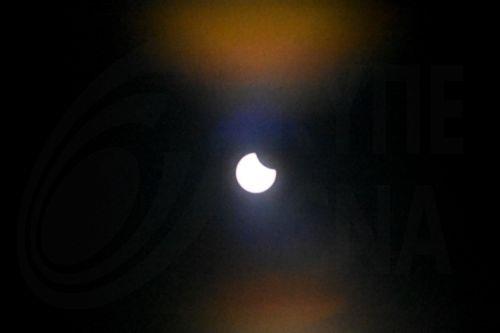 epa11996930 View of a partial solar eclipse in the sky over Szczecin city, northwestern Poland, 29 March 2025.  EPA/Marcin Bielecki POLAND OUT