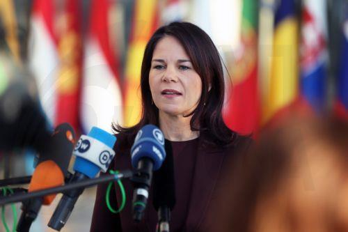 epa12008723 German Foreign Minister Annalena Baerbock speak to members of the media during a North Atlantic Treaty Organization (NATO) Ministers of Foreign Affairs meeting in Brussels, Belgium, 04 April 2025.  EPA/OLIVIER HOSLET