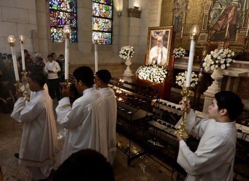 epa12045851 Altar boys attend a mass in memory of Pope Francis at a cathedral in Manila, Philippines, 22 April 2025. Pope Francis died on 21 April 2025 at the age of 88, according to the Holy See. Born Jorge Mario Bergoglio in Buenos Aires, Argentina, on 17 December 1936, he was appointed leader of the Catholic Church on 13 March 2013, succeeding Pontiff...