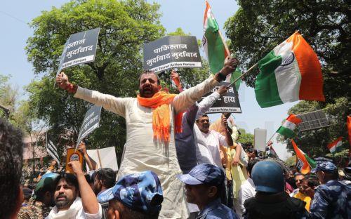 epaselect epa12050865 Members of the Anti-Terror Action Forum hold anti-Pakistan placards as they protest near the Pakistan High Commission in New Delhi, India, 24 April 2025. Protests have erupted near the Pakistan High Commission amid escalating tensions between Delhi and Islamabad following the deadly attack in the popular tourist destination of Pahalgam...