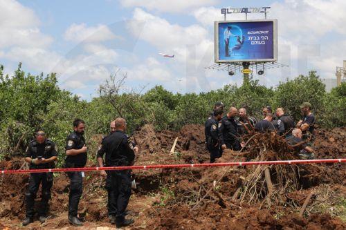 epa12072594 Police inspect the damage caused by a ballistic missile fired from Yemen at the Ben Gurion airport near Tel Aviv, Israel, 04 May 2025. According to Israel's military spokesperson, a ballistic missile fired from Yemen hit at the Ben Gurion airport. Yemen's Houthis have claimed responsibility for launching the missile.  EPA/ABIR SULTAN