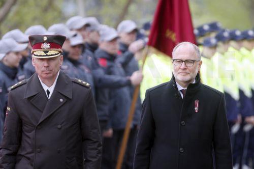 epa12072768 Latvian Defense Minister Andris Spruds (R) and Commander of the National Armed Forces Kaspars Pudans attend the Latvian Independence Restoration Day military parade in Talsi, Latvia, 04 May 2025. The day marks a national holiday celebrated annually with the traditional military parade taking place in a different regional center since 2013. ...