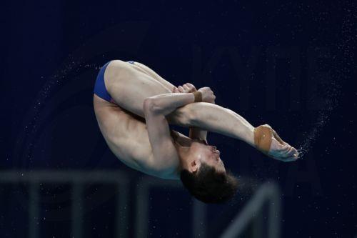 epa12072797 Zhu Zifeng of China competes in the Men 10m Platform event at the World Aquatics Diving World Cup 2025 Super Final in Beijing, China, 04 May 2025.  EPA/ANDRES MARTINEZ CASARES