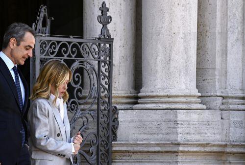 epa12093605 Italian Prime Minister Giorgia Meloni (R) and Greek Prime Minister Kyriakos Mitsotakis (L) at Villa Pamphili ahead of the Italy-Greece Intergovernmental Summit in Rome, Italy, 12 May 2025.  EPA/RICCARDO ANTIMIANI