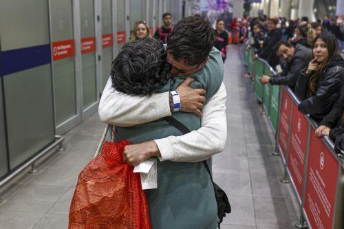 epaselect epa12127510 A Chilean migrant (back) is welcomed upon his arrival at Arturo Merino Benitez International Airport in Santiago de Chile, Chile, 23 May 2025. Authorities confirmed that 45 Chilean citizens arrived from the United States after being deported under new immigration guidelines pushed by Donald Trump's administration, which has intensified...