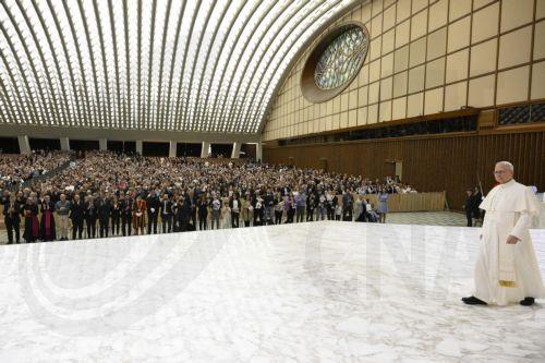 epa12130112 A handout picture provided by the Vatican Media shows Pope Leo XIV (R) attending an audience with officials and employees of the Roman Curia, in Vatican City, 24 May 2025. The Roman Curia, consisting of administrative institutions of the Holy See, assists the pope in his role as the head of the Catholic Church.  EPA/VATICAN MEDIA HANDOUT HANDOUT...