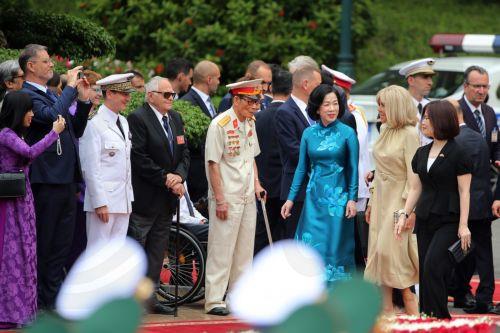 epa12136160 Vietnamese President Luong Cuongâ€™s wife Nguyen Thi Minh Nguyet (3-R) and French President Emmanuel Macronâ€™s wife Brigitte Macron (2-R) walk during a welcome ceremony at the Presidential Palace in Hanoi, Vietnam, 26 May 2025. Macron is on a state visit to Vietnam from 25 to 27 May 2025.  EPA/LUONG THAI LINH / POOL