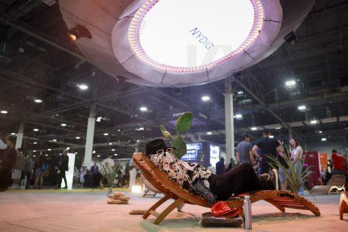 epa12142032 A person sits back in a lounge area during The Bitcoin Conference at The Venetian Las Vegas in Las Vegas, Nevada, USA, 28 May 2025.  EPA/CAROLINE BREHMAN