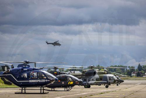 epa12151013 Helicopters of the Swiss Air Force, top, the German Bundespolizei, Lithuania Air Force, and the Czech Air Force, take off during an international air radiometry exercise on the Duebendorf Military Air Base, in Duebendorf, Switzerland, 02 June 2025. Specialists from France, Germany, the Czech Republic, Lithuania and Switzerland are taking part in...