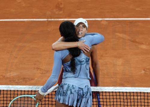 epa12154642 Coco Gauff of the USA (front) celebrates winning her Women's quarterfinals match as she hugs  Madison Keys of the USA at the French Open Grand Slam tennis tournament at Roland Garros in Paris, France, 04 June 2025.  EPA/MOHAMMED BADRA