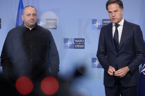 epa12154968 NATO Secretary General Mark Rutte (R) speaks next to Ukrainian Defense Minister Rustem Umerov as they deliver remarks to the media before a meeting of the Ukraine Defense Contact group, at the North Atlantic Treaty Organization (NATO) headquarters in Brussels, Belgium, 04 June 2025. The NATO ministers of defence will meet in Brussels on 05 June....