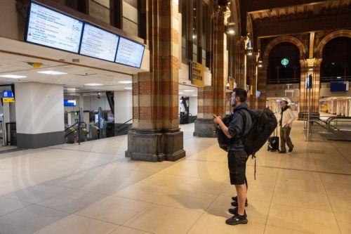 epa12159337 A view of Amsterdam Centraal station during a strike by NS staff, who are striking for more pay in Utrecht, Netherlands, 06 June 2025. The strike affects the area around Utrecht, a crucial hub in the national rail network, which disrupts train traffic throughout the country.  EPA/SIMON LENSKENS