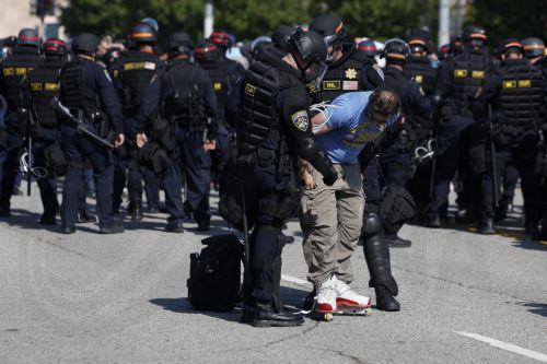epa12169453 California Highway Patrol (CHP) officers detain protesters in Los Angeles, California, USA, 10 June 2025. US President Donald Trump has deployed 2,000 National Guard troops, despite not receiving a request from the state of California for any additional assistance, following large protests against ongoing immigration enforcement raids in the Los...