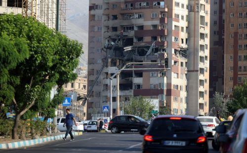 epa12172820 A view of a building that was hit by Israeli air strikes north of Tehran, Iran, 13 June 2025. Israel confirms it has launched strikes on Iran's 'nuclear program' as blasts are heard across the country. The strikes are part of Operation Rising Lion, Israel's Prime Minister Benjamin Netanyahu said, adding Iran was a threat to "Israel's very...