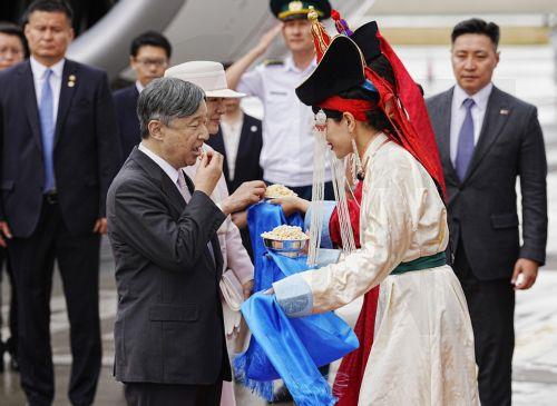 epa12220178 Japanese Emperor Naruhito (L) and Empress Masako (C) arrive at Chinggis Khaan International Airport in Ulaanbaatar, Mongolia, 06 July 2025. The Emperor and Empress of Japan arrived in Mongolia for an eight-day state visit.  EPA/JIJI PRESS JAPAN OUT EDITORIAL USE ONLY