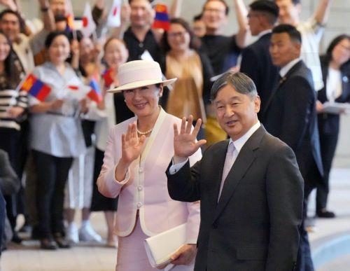 epa12220179 Japanese Emperor Naruhito (R) and Empress Masako (L) are greeted upon their arrival at their hotel in Ulaanbaatar, Mongolia, 06 July 2025. The Emperor and Empress of Japan arrived in Mongolia for an eight-day state visit.  EPA/JIJI PRESS JAPAN OUT EDITORIAL USE ONLY