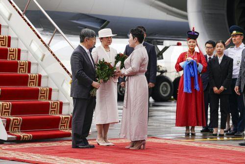 epa12220180 Japanese Emperor Naruhito (L) and Empress Masako (2-L) arrive at Chinggis Khaan International Airport in Ulaanbaatar, Mongolia, 06 July 2025. The Emperor and Empress of Japan arrived in Mongoliar for an eight-day state visit.  EPA/JIJI PRESS JAPAN OUT EDITORIAL USE ONLY