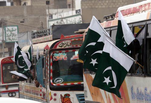 epa12282402 International and local students of Jamia Binoria Alamia attend the Marka Haq rally ahead of Independence Day celebrations in Karachi, Pakistan, 03 August 2025. Pakistan celebrates its Independence Day on 14 August, commemorating the end of British rule in August 1947.  EPA/REHAN KHAN 92296