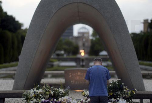 epa12283551 A man offers prayers before the Cenotaph for the Atomic Bomb victims at the Peace Memorial Park in Hiroshima, western Japan, early 05 August 2025. On 06 August 2025, Japan will mark the 80th anniversary of the bombing of Hiroshima. In 1945 the United States dropped two nuclear bombs over the cities of Hiroshima and Nagasaki on 06 and 09 August...