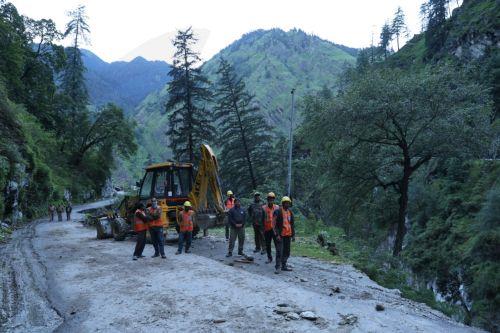 epa12288326 Workers from Border Roads Organisation (BRO) prepare to repair the damaged bridge after the cloudburst in the Uttarkashi district, Uttarakhand state, northern India, 07 August 2025. State officials said a powerful cloudburst struck the Dharali area of Uttarkashi district in Uttarakhand triggering flash floods that swept away a village, leaving...