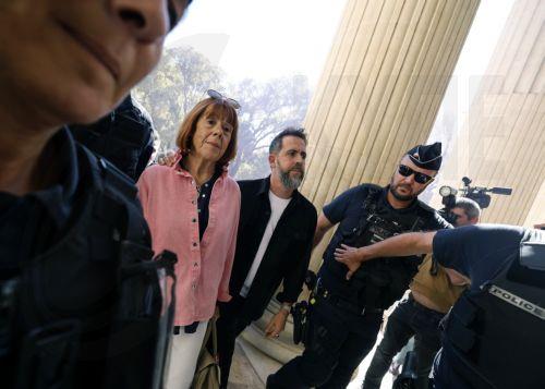 epa12434707 Gisele Pelicot (C-L), accompanied by her son Florian Pelicot (C-R), arrives at the Gard criminal court, in Nimes, France, 06 October 2025. An appeal trial involving one of the defendants sentenced in the mass rapes committed against her will be heard by the court from 06 through 09 October.  EPA/GUILLAUME HORCAJUELO  EPA/GUILLAUME HORCAJUELO