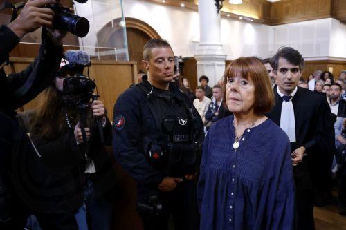 epa12434762 Gisele Pelicot (C-R) arrives in the courtroom of the Gard criminal court, in Nimes, France, 06 October 2025. An appeal trial involving one of the defendants sentenced in the mass rapes committed against her will be heard by the court from 06 through 09 October.  EPA/GUILLAUME HORCAJUELO