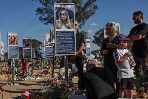 epa12436540 Israeli family members visintg the memorials at the site of the Nova music festival, near Re'im, on the second anniversary of the 07 October 2023 Hamas attacks, near the Gaza border, southern Israel, 07 October 2025. October 07 marks two years since the Palestinian militant group Hamas launched a surprise attack on Israel, taking dozens of...