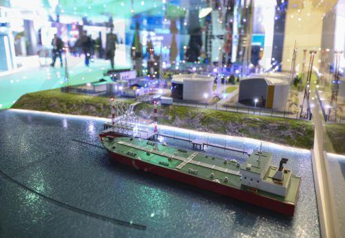 epa12454943 Visitors examine an exhibition during the Russian Energy Week 2025 International Forum (REW) in Moscow, Russia, 15 October 2025.  EPA/MAXIM SHIPENKOV