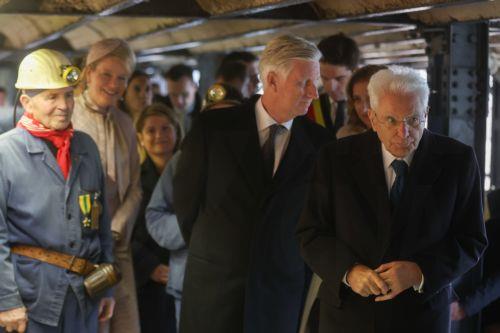 epa12469765 Italy's President Sergio Mattarella (R) and King Philippe (2-R) of Belgium, along with old miners, visit the Bois du Cazier, a former coal mine in the Marcinelle district of Charleroi, Belgium, 21 October 2025, as part of a state visit. On 08 August 1956, a major mining disaster occurred at the Bois du Cazier coal mine, killing 262 men, most of...