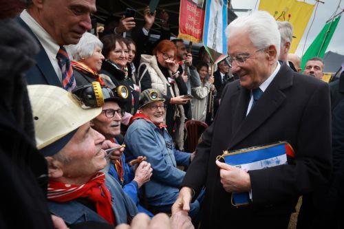 epa12469769 Italy's President Sergio Mattarella, along with old miners, pays tribute during a visit to the Bois du Cazier, a former coal mine in the Marcinelle district of Charleroi, Belgium, 21 October 2025, as part of a state visit. On 08 August 1956, a major mining disaster occurred at the Bois du Cazier coal mine, killing 262 men, most of them Italian...